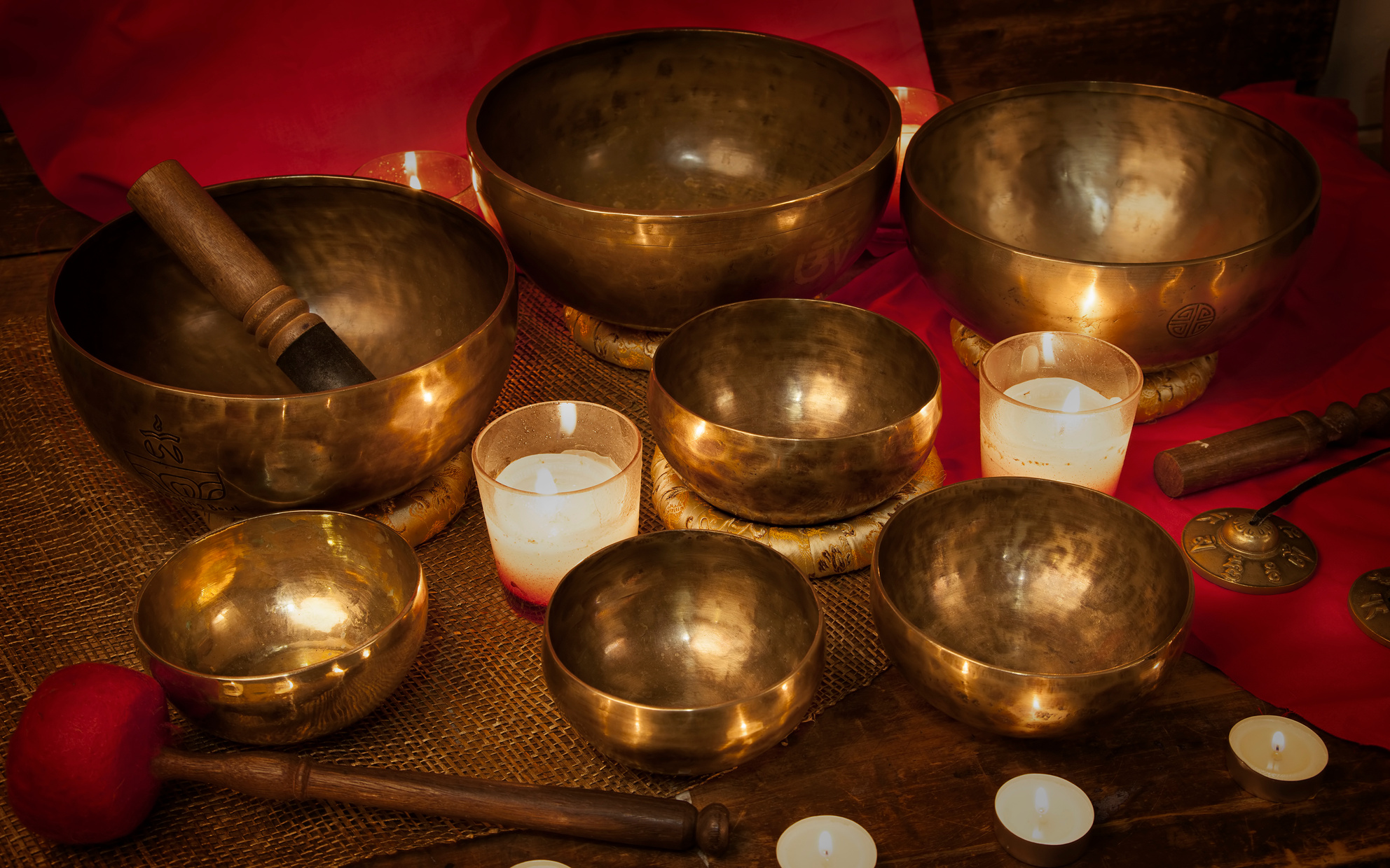 Tibetan singing bowls with candles