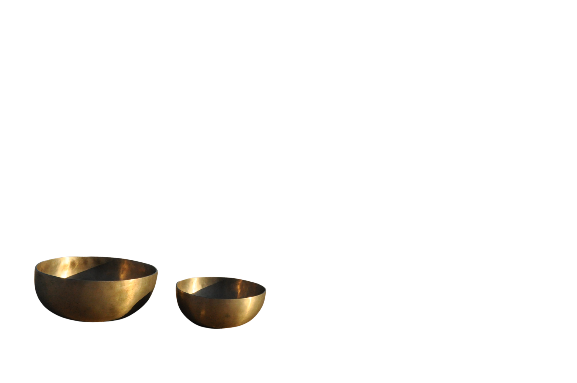 Two singing bowls by the sea